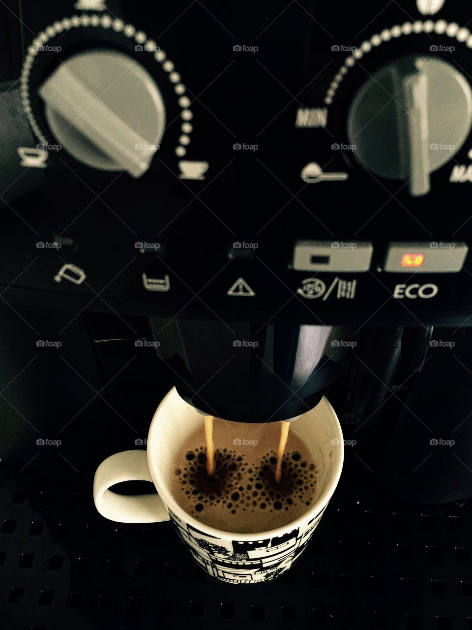 Making coffee. Closeup image of coffee machine brewing coffee