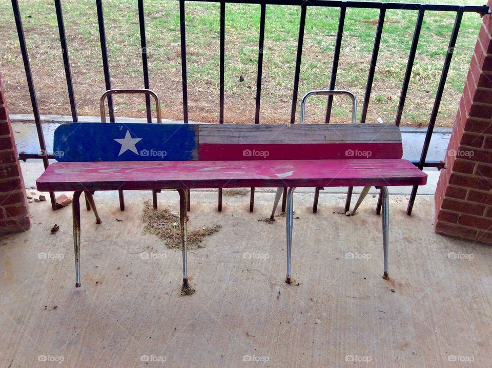 A couple of chair frames, some wood, and a little paint...equals a redneck bench!