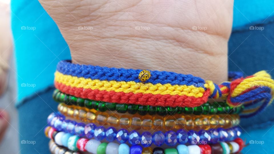 Bracelets and a ladybug