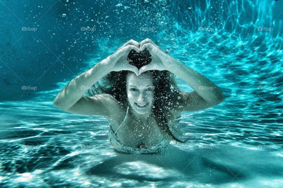 While swimming in Hawaii, this image was captured with love as its message.