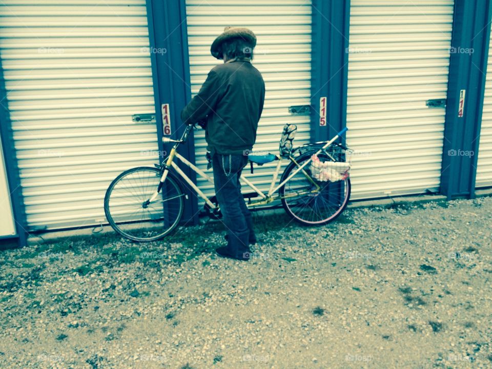 Strange Fellow with Cool Bike. Was going to the storage unit and came across this fellow, I asked him if I could take a picture and he said "go for it"