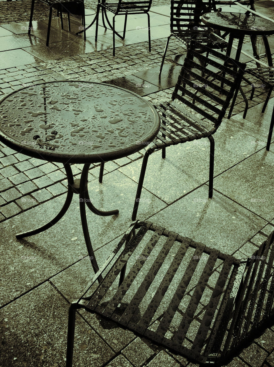 outdoors table rain wet by miamania