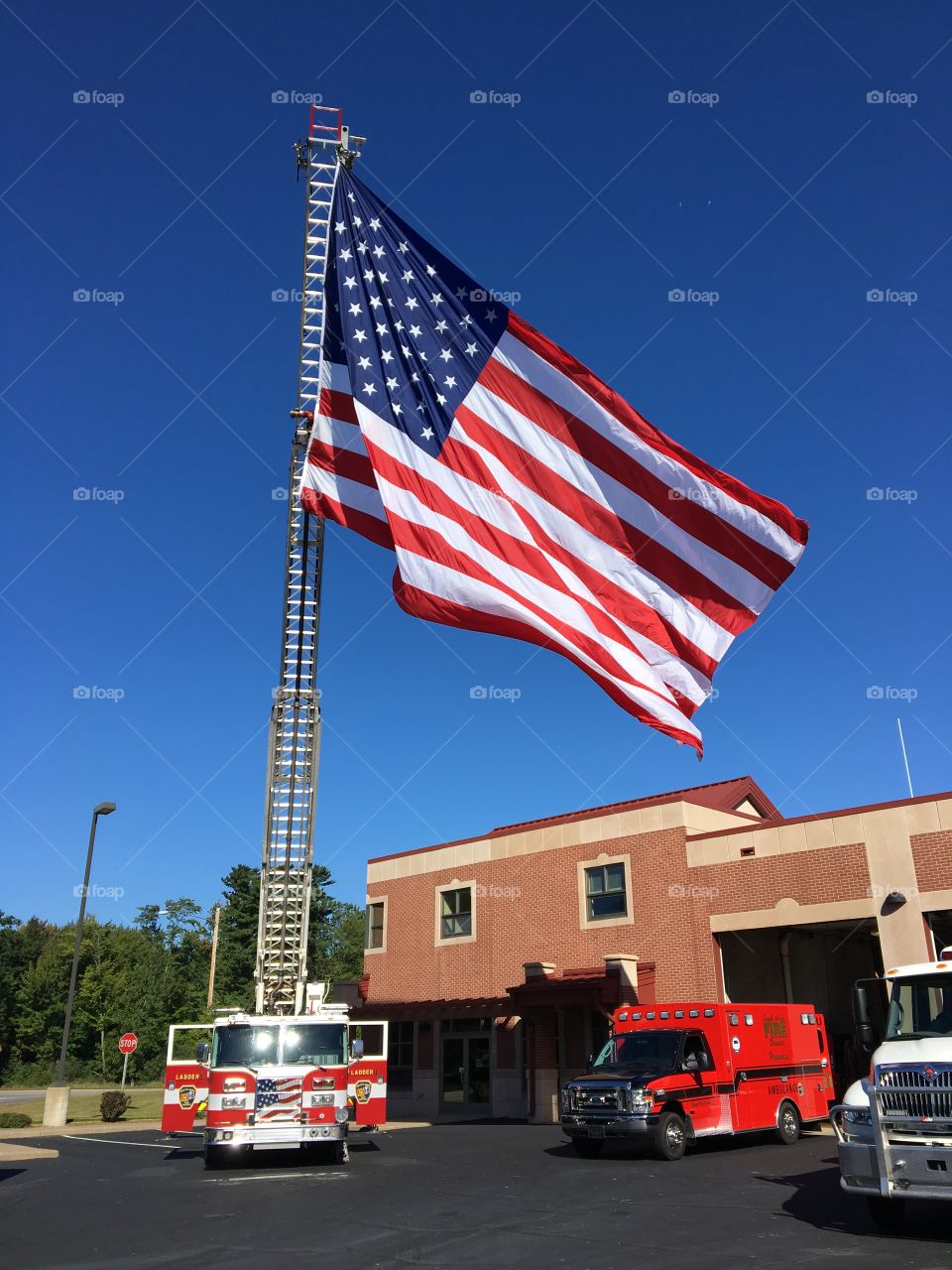 US flag and fire truck