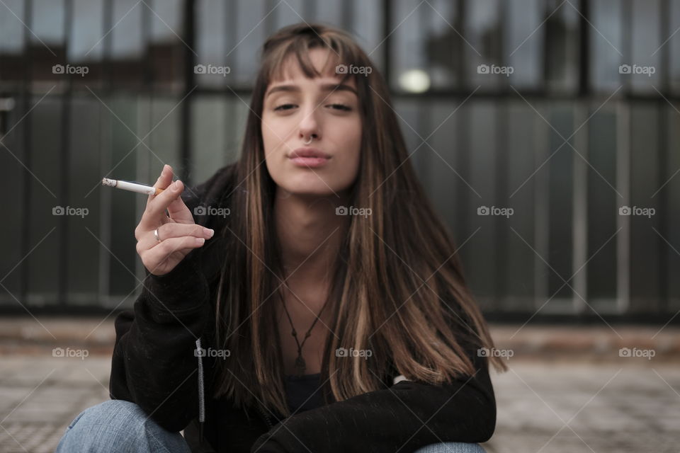 urban girl smoking cigar