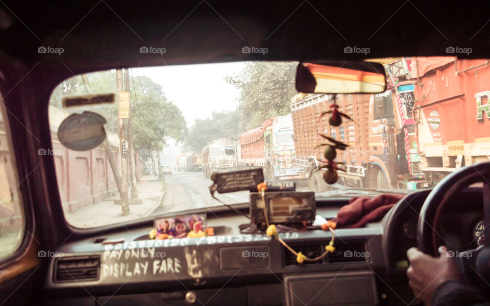 Hide Road, Kolkata, West Bengal, 10th January. 2019: Car point of view inside out, Drive in the City. Transportation landscape photography.