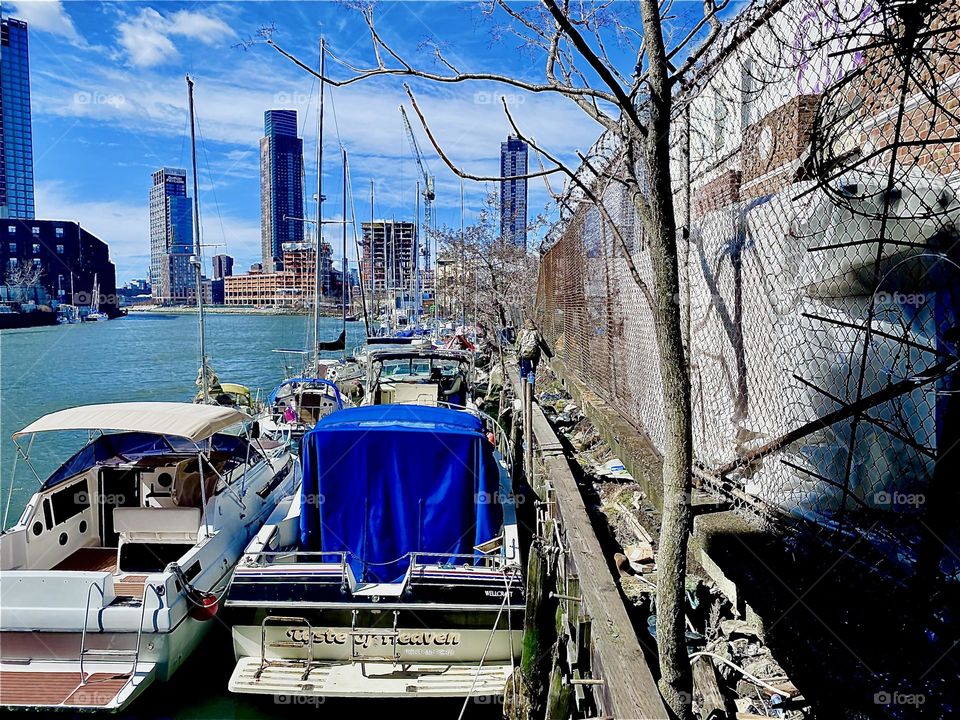 The boats here at “Newtown Creek” by the “Pulaski Bridge” in LIC, Queens add an idyllic touch to a neighborhood that is already special with fantastic views all around that reach all the way to “Manhattan”. 2023. Hypnotic Productions