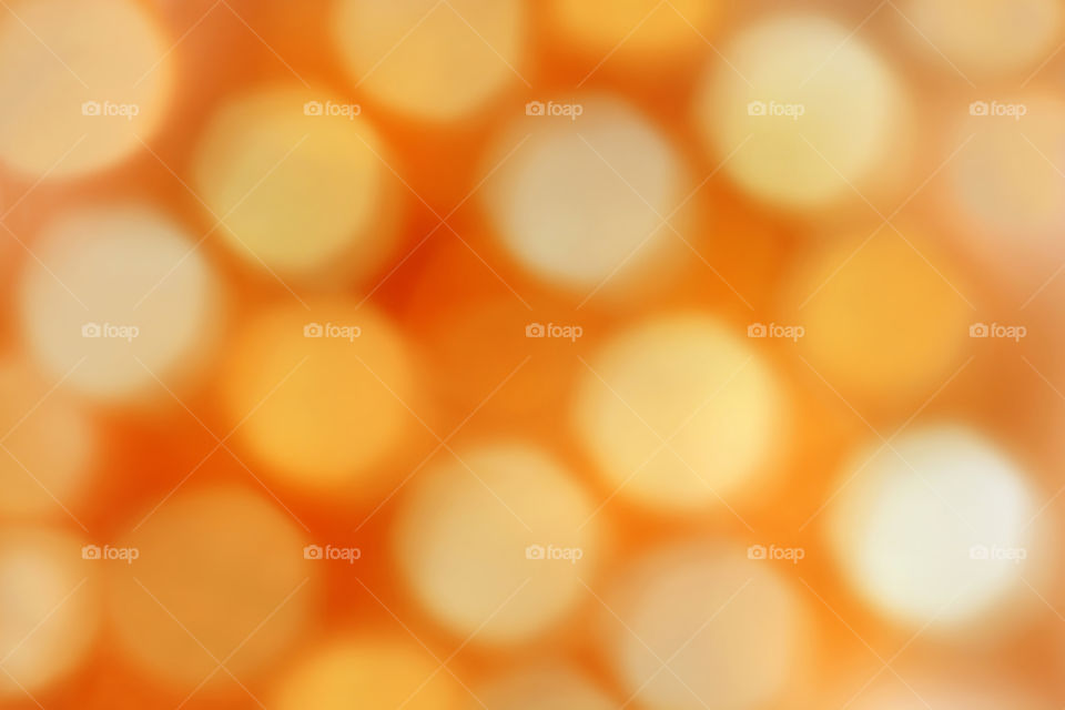 Yellow bokeh background. Gold bokeh background.