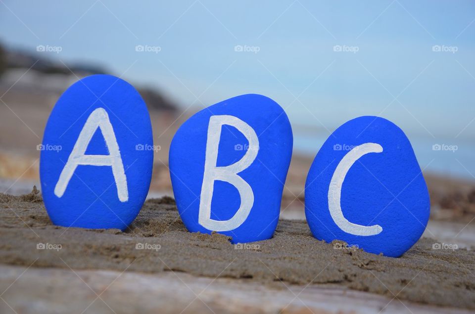 ABC on blue stones