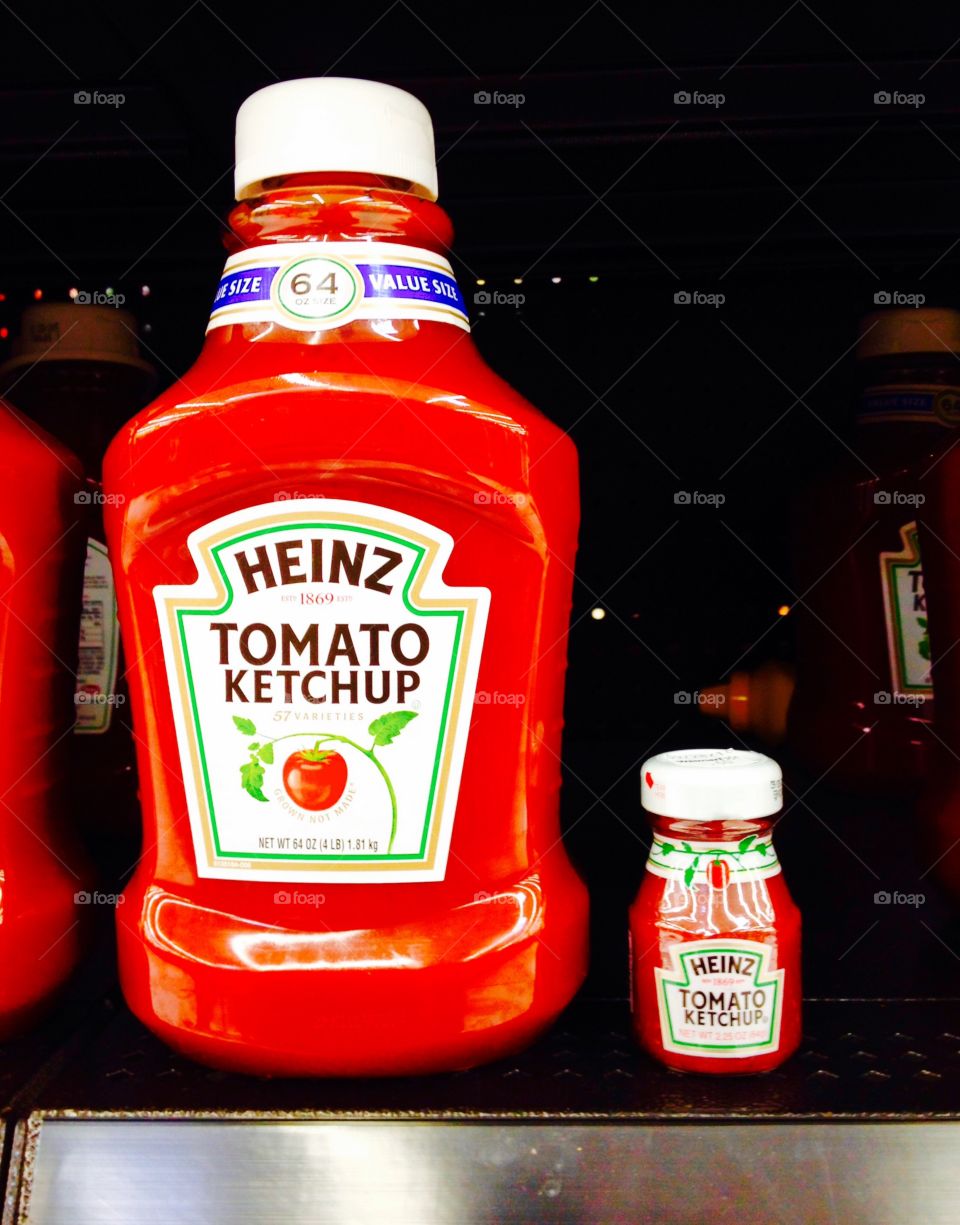 Grocery Store Huge & Tiny Size Ketchups

I couldn't believe my eyes when I saw these two sizes of Heinz Ketchup on the shelf. I had to show you this picture because I couldn't believe it!