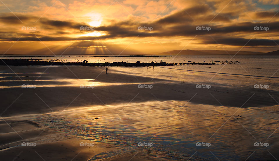 Sunrise at Silverstrand beach in Galway, Ireland