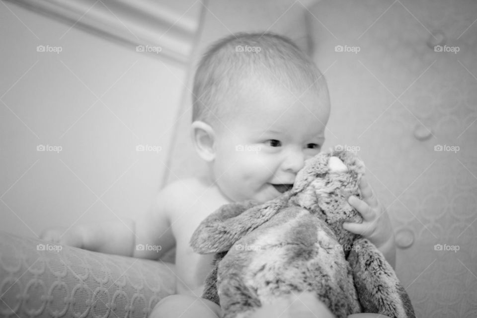 Baby boy with stuffed toy