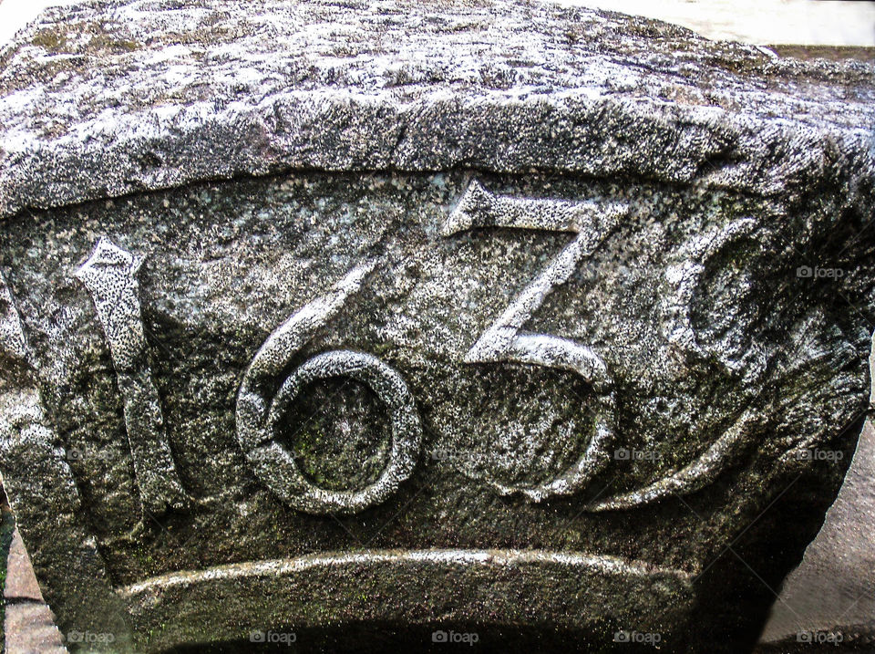 A stone inscription of the arrival of Dutch to Indonesia, listed the year of arrival.