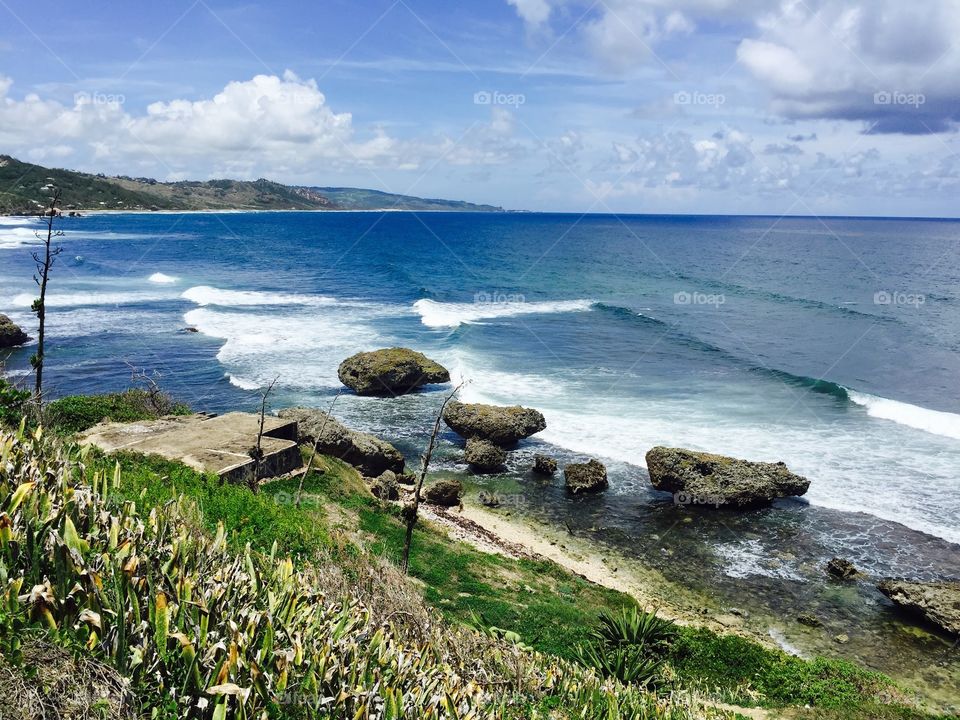 Stunning hilltop view of surf spot Soup Bowls, Bathsheba in Barbados with a beautiful sunny day.