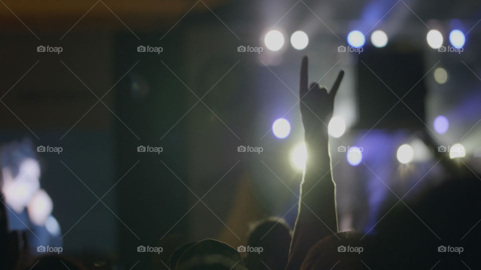 Hands of fans at a concert