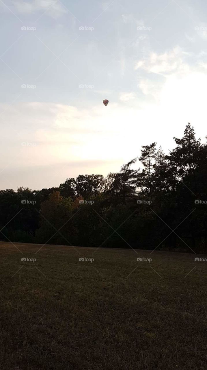 Baloon in sunset