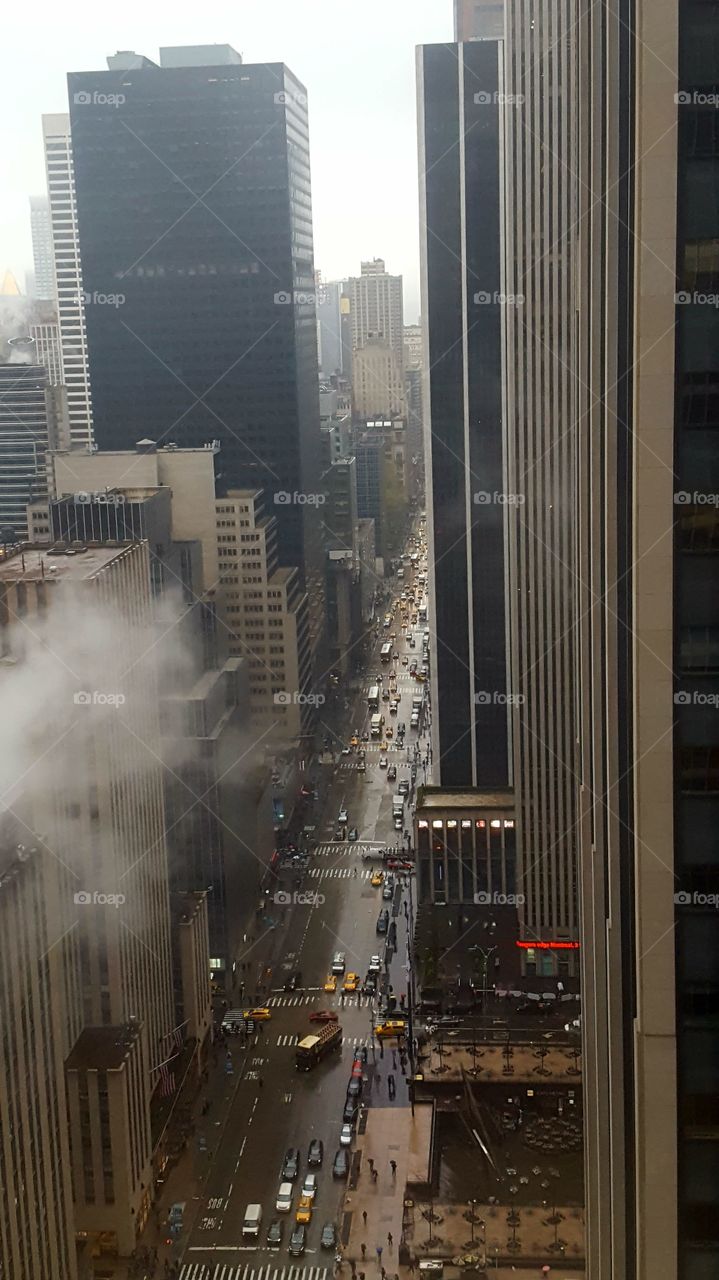 Midtown Manhattan morning traffic in the rain