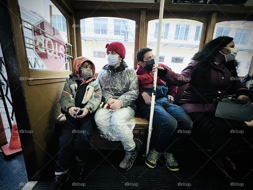 Family commute by tram in San Francisco 