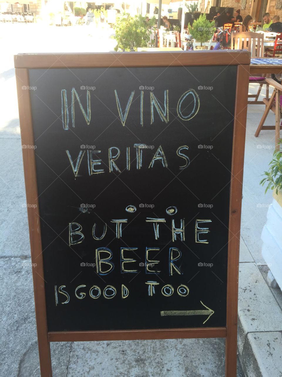 Café sign in vino veritas