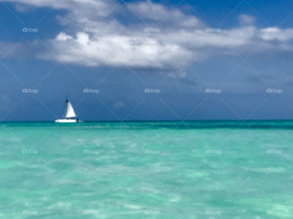 Sailboat on clear wasters