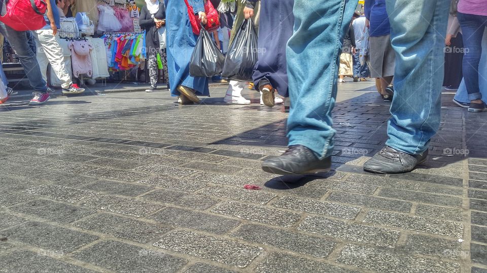 walking on street. shoes and feets walking in istambul