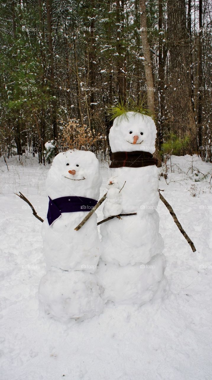 Snowman in forest