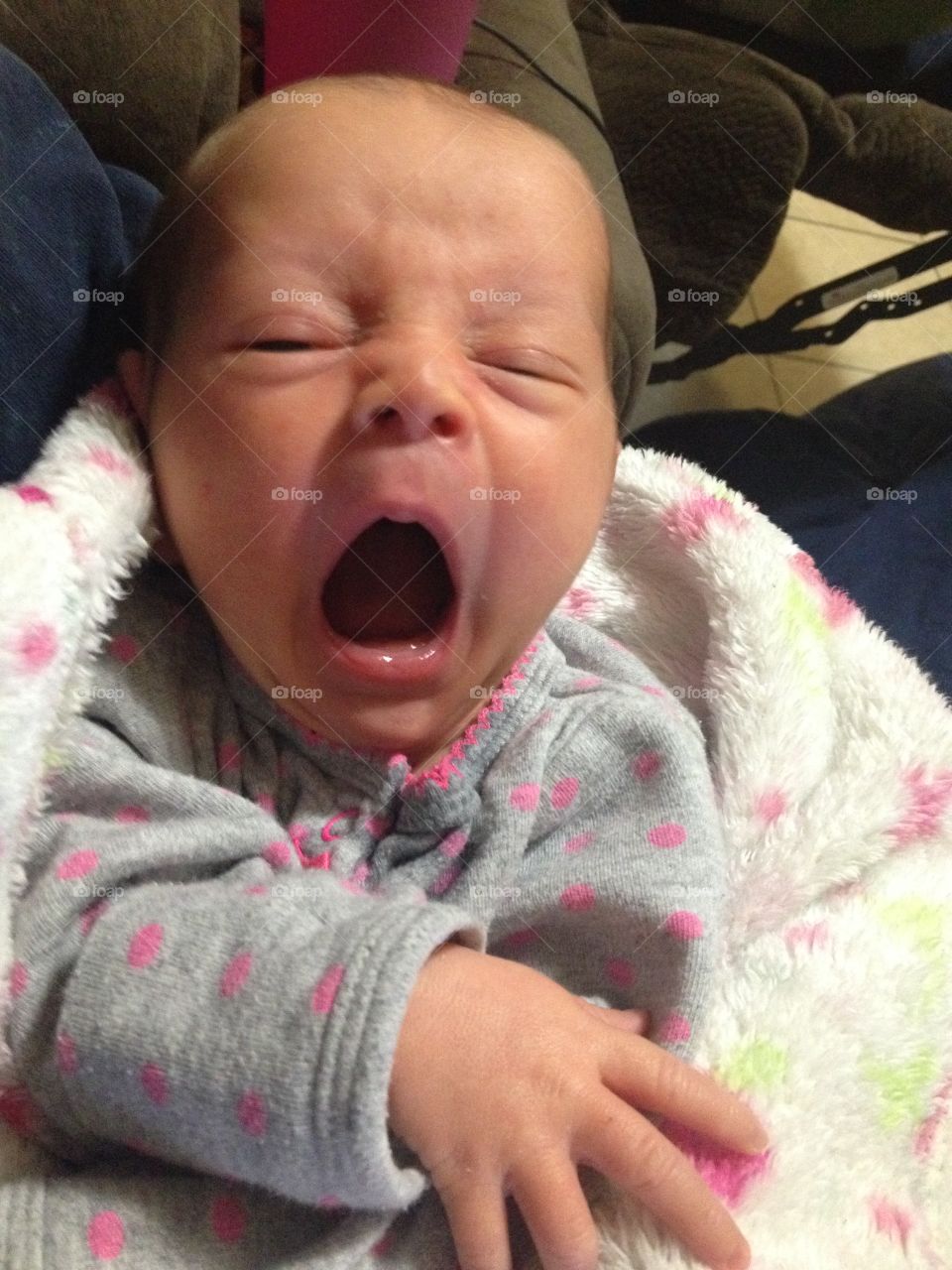 Baby yawn. Newborn baby girl yawning 