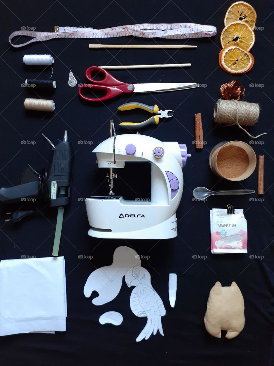 the desktop of a creative person who sews and decorates handmade toys