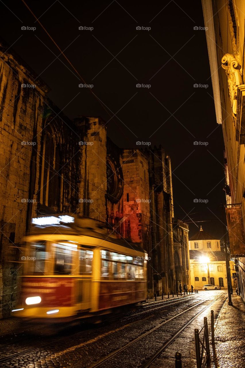 Night Tram on the Narrow Streets of Lisbon