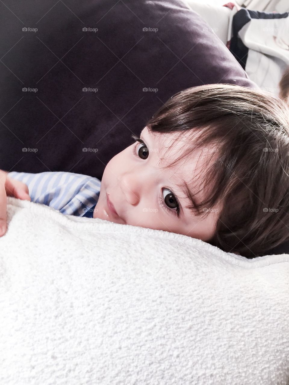 Cute baby laying on pillow 