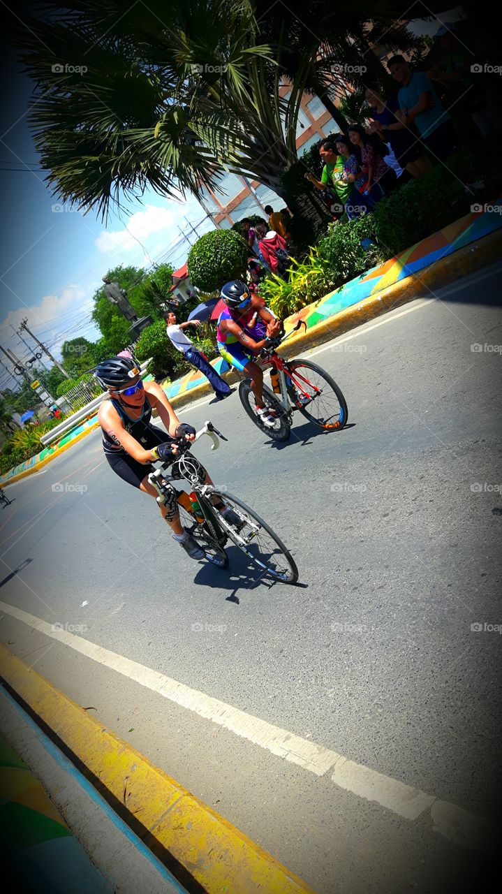 Women competes with men in IRONMAN TRIATHLON in Mactan Cebu, Philippines