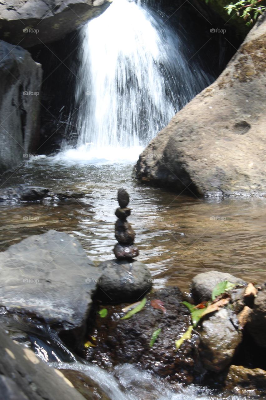 stacked stones in the river