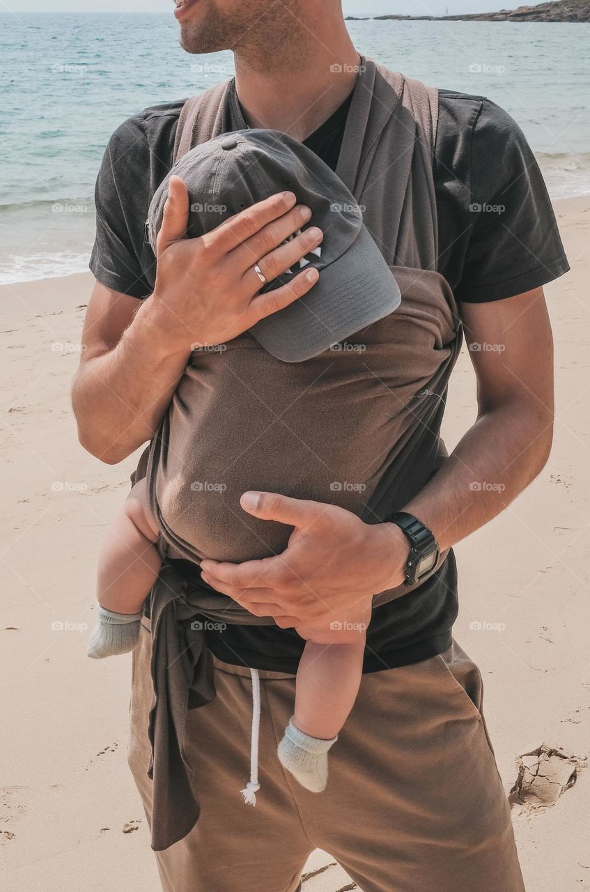 father holding a son