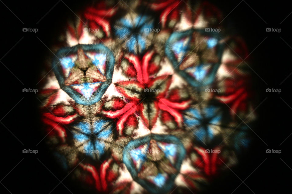      An image of what it looks like to look through the eyepiece of a sculpture I made.  It's a fiber optic kaleidoscope called "An Eye Single".