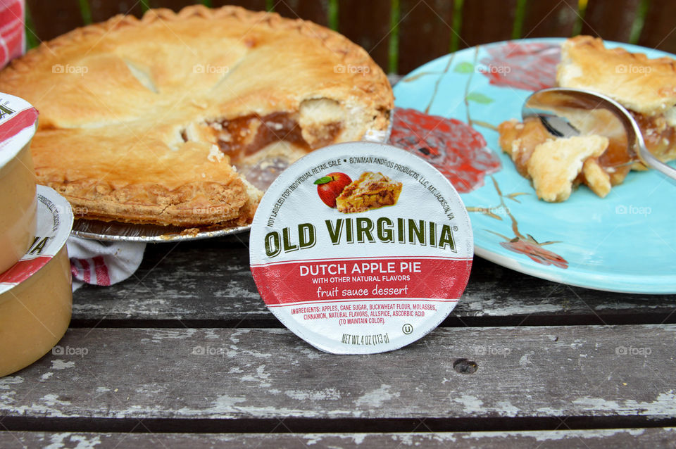 Old Virginia dessert cup next to an apple pie and a dessert plate