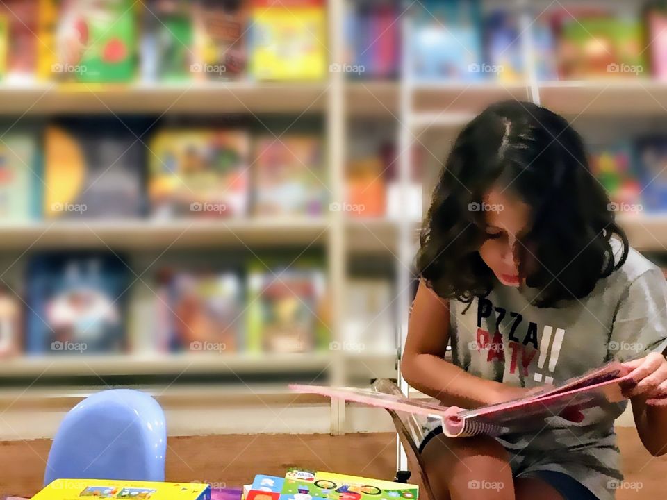 girl reading in the library