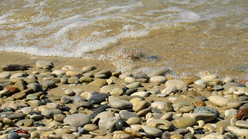 Rocks tossed on beach