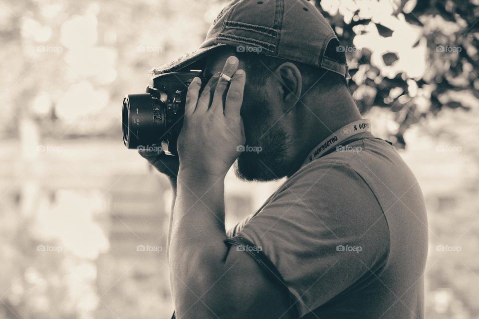 photographer with a cigarette black white photo