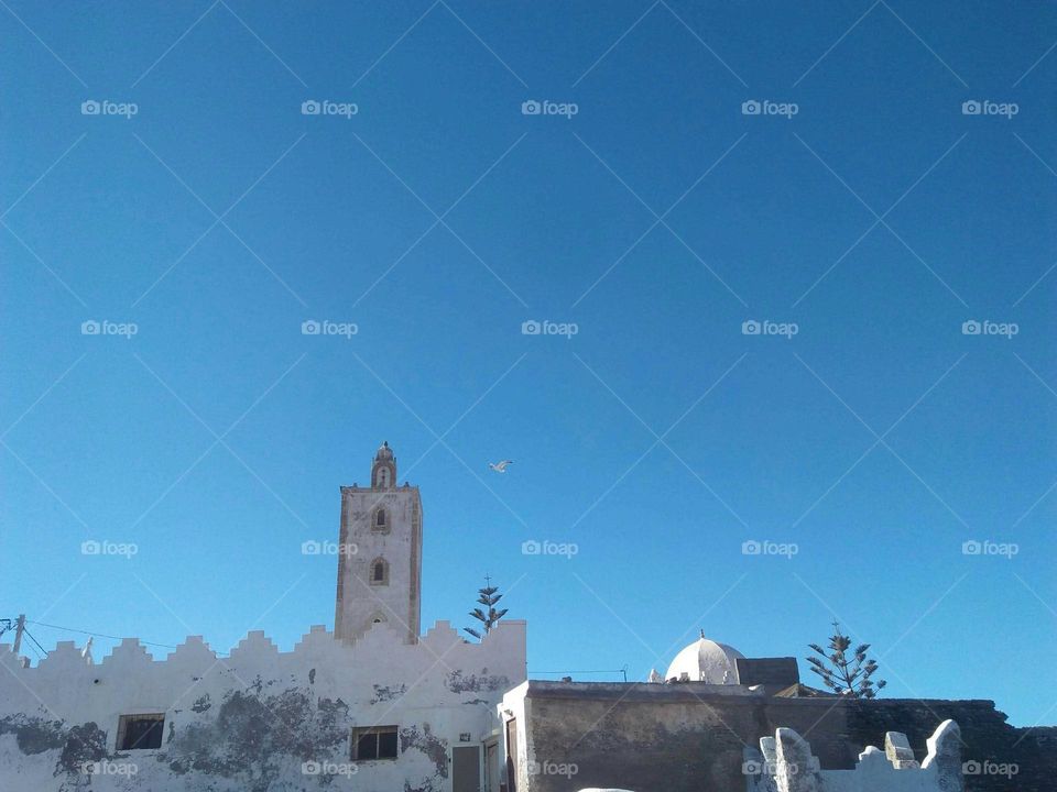 Beautiful white minaret at essaouira city in Morocco.