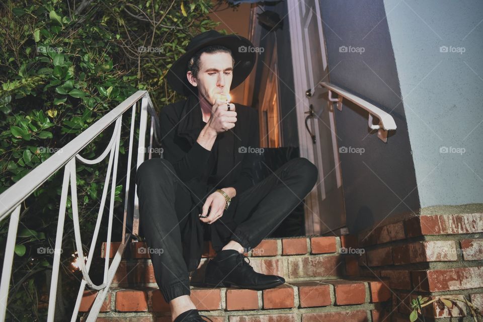 Portrait of a man smoking cigarette