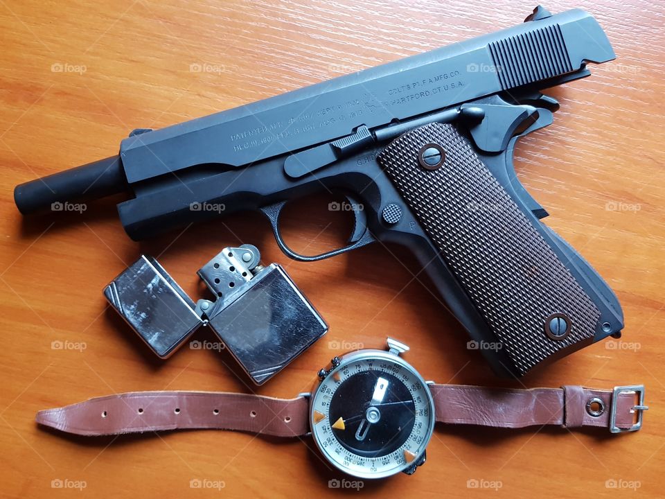 Colt M1911A1 Inokatsu with Zippo lighter and compass