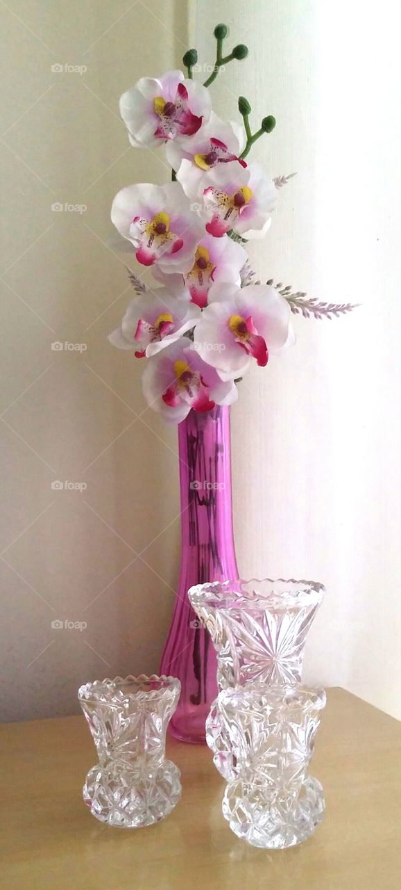 Pink vase and glass vases