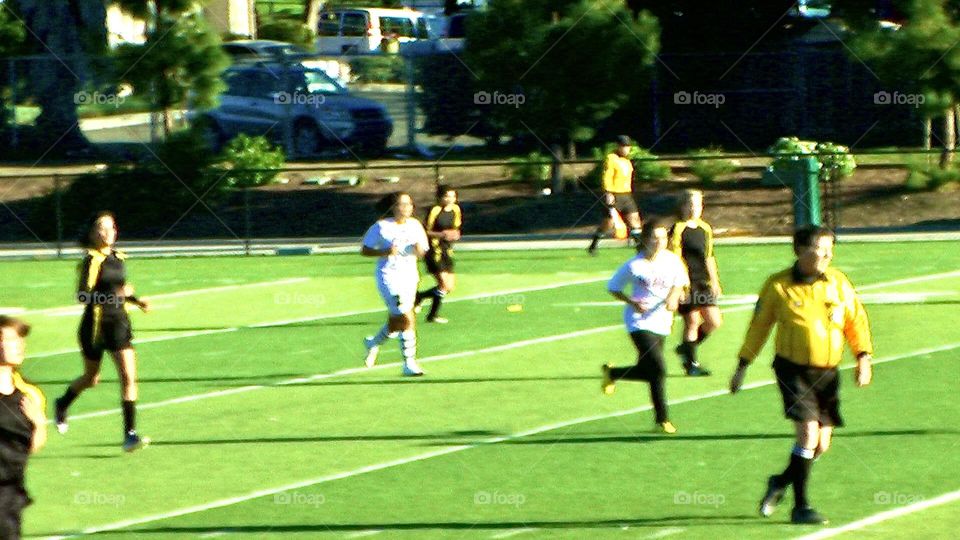 Girls high school soccer team on the field 