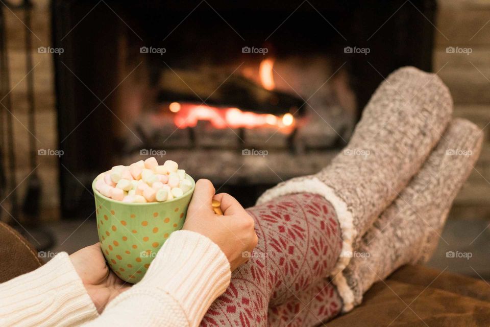Hot chocolate with marshmallows by the fire