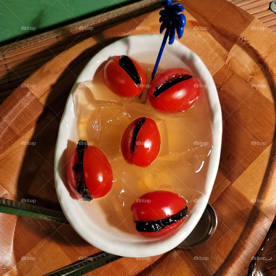 Tomato with preserved plum seedless and aiyu jelly, or ice jelly.