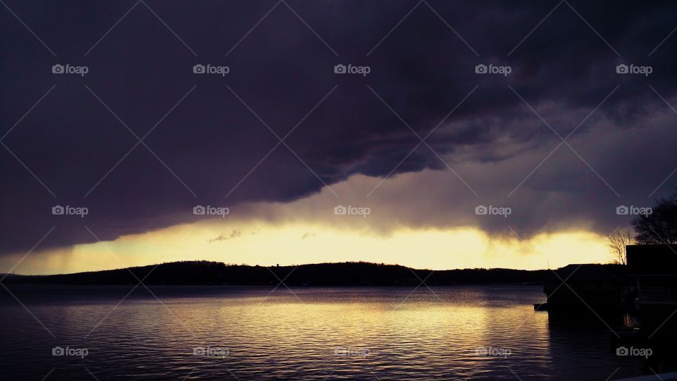 View of storm clouds over sea