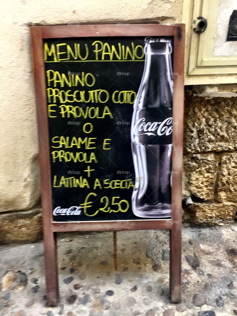 Old Coke blackboard on street food 