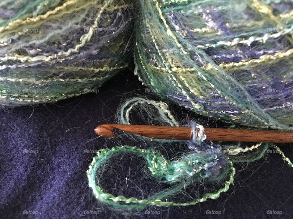 Close up yarn with crochet hook 