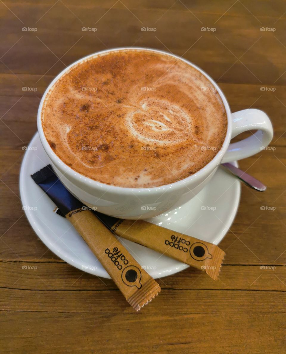 Coffee circle ellipce yummy served table day part yellow foam