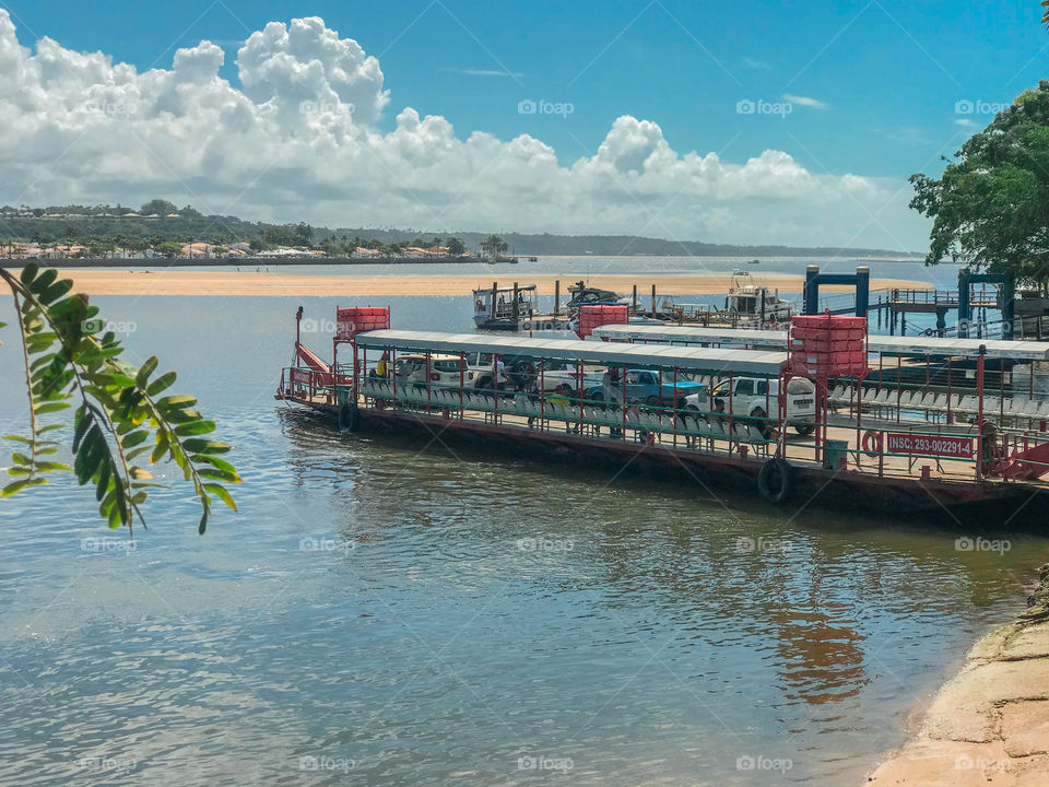 Ferry for crossing cars and pedestrians in arraial d'ajuda Bahia Brasil