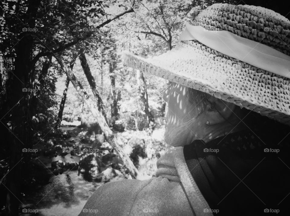 Woman in Straw Hat At brook. Woman in Straw Hat At brook